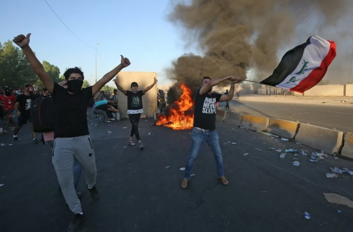 Des Irakiens manifestent dans le centre de Bagdad le 4 octobre 2019