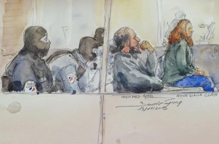 Croquis d'audience du 19 novembre 2019 montrant Mohamed Amri (2D) et Anne Diana Clain (D), durant leur procès à Paris