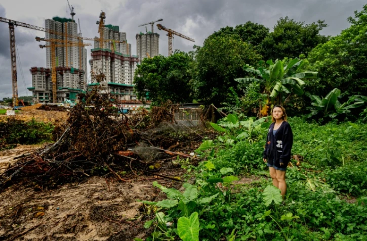 Niki So, une habitante de Kwu Tung dont la maison doit être démolie par les autorités pour faire place à un vaste projet de pôle technologique, le 17 juin 2026 dans les Nouveraux Territoires à Hong Kong