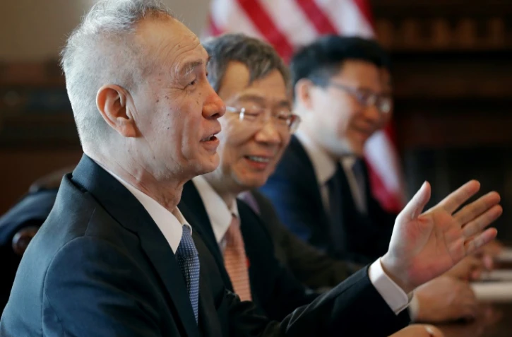 Le Vice-Premier ministre Liu He, au premier plan, lors, et sa délégation, à la table des négociations avec les membres de l'administration américaine, le 30 janvier 2019 à Wahsington  