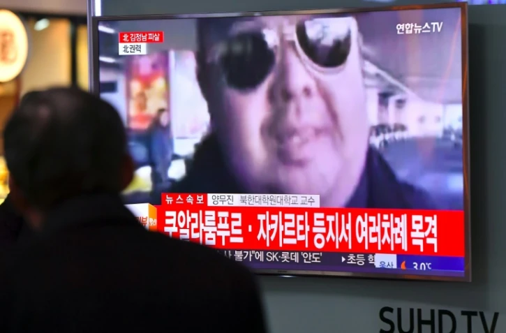 Le portrait de Kim Jong-Nam, le demi-Frère de Kim Jong-Un apparaît sur un écran de télévision, à Séoul le 14 février 2017
