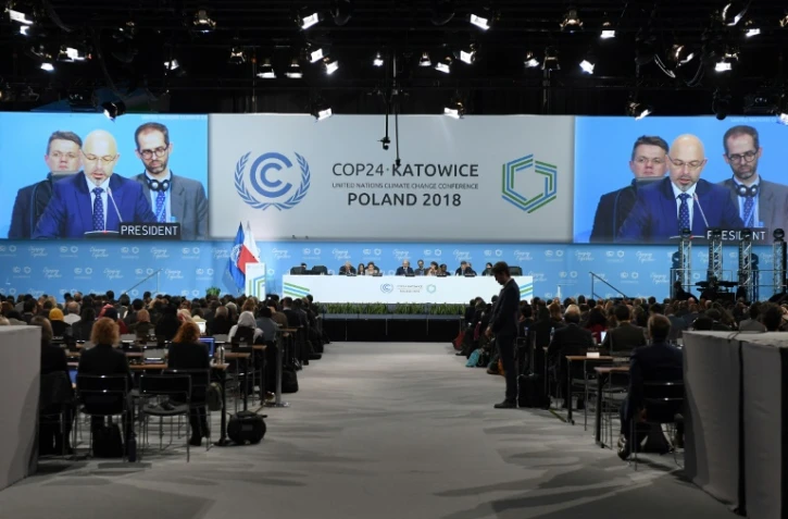 Le ministre de l'Environnement polonais et président désigné de la COP24 Michal Kurtyka s'adresse à l'audience lors de la session inaugurale de la COP24, le 2 décembre 2018 à Katowice