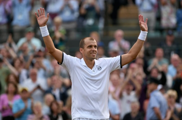 Le Luxembourgeois Gilles Muller après sa victoire face à l'Espagnol Rafael Nadal, le 10 juillet 2017 à Wimbledon