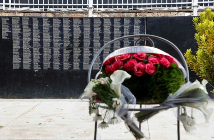 Un mur commémorant les victimes du génocide rwandais, au mémorial de Kigali le 26 mai 2021, à la veille de la visite du président français Emmanuel Macron
