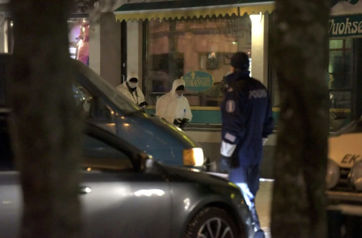 Des enquêteurs de la police près d'une scène de crime à Imatra, en Finlande, le 4 décembre 2016