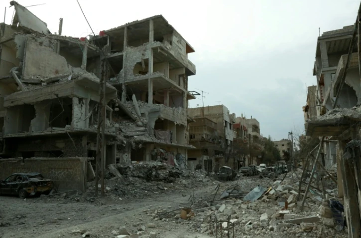 Des immeubles détruits par des bombardements du régime syrien, le 25 février 2018 à Douma, dans la Ghouta orientale