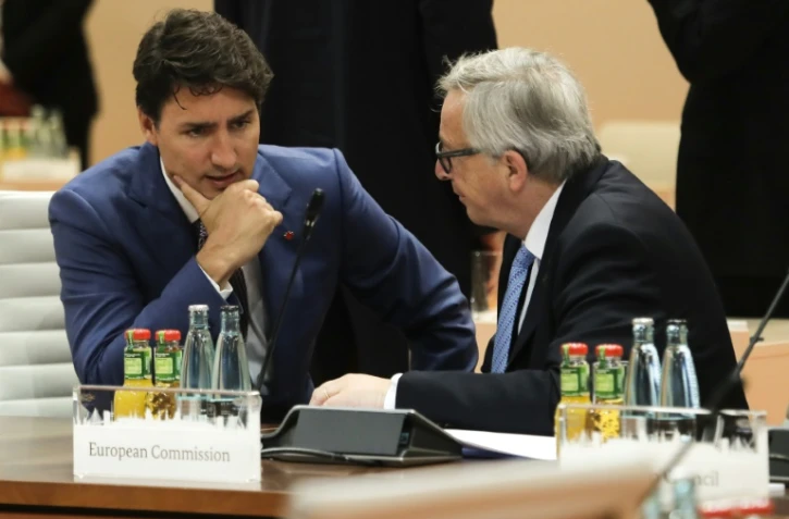 le Premier ministre canadien Justin Trudeau et le président de la Commission européenne Jean-Claude Juncker à Hambourg, en Allemagne, le 8 juillet 2017 