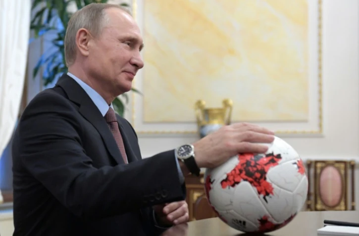 Le président russe Vladimir Poutine lors d'une rencontre avec des officiels de la Fifa, le 25 novembre à Moscou