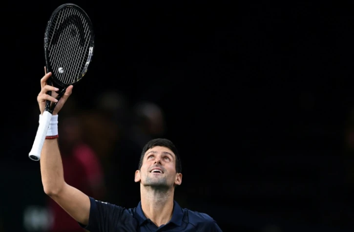 Le Serbe Novak Djokvic exulte après sa victoire face au Français Corentin Moutet au 2e tour du Masters 1000 de Paris, le 30 octobre 2019