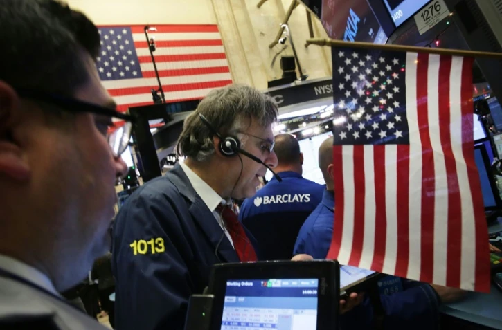 Des traders à la Bourse de New York , le 8 décembre 2015.