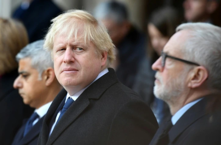 De G à D, le maire de Londres Sadiq Khan, le Premier ministre britannique Boris Johnson et le chef du Labour Jeremy Corbyn participent le 2 décembre 2019 à Londres à un hommage aux victimes de l'attentat de London Bridge