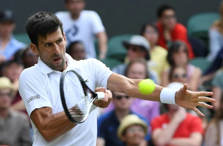 Le Serbe Novak Djokovic face au Slovaque Martin Klizan lors du 1er tour à Wimbledon, le 4 juillet 2017