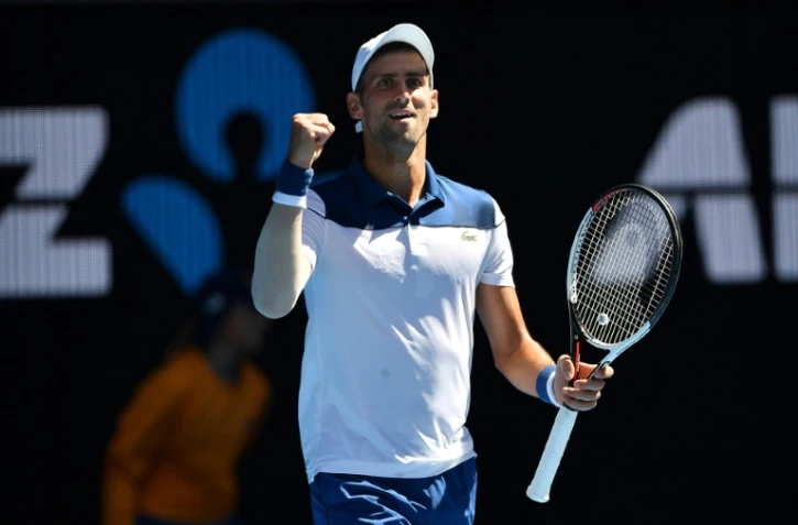 Le Serbe Novak Djokovic lors de sa victoire face à l'Américain Donald Young à l'Open d'Australie le 16 janvier 2018