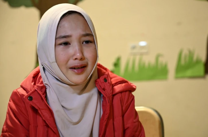 Fatima, une écolière ouïghoure de neuf ans, durant une interview avec l'AFP, le 29 novembre 2019 à Istanbul