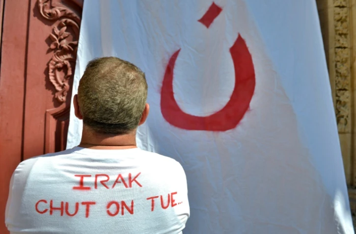 Symbole des Chrétiens d'Orient, lors d'un rassemblement contre leur persécution à Lyon le 26 juillet 2014