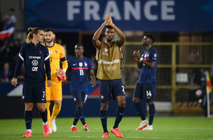 Antoine Griezmann, Hugo Lloris, Moussa Diaby,  Kingsley Coman et Aurélien Tchouaméni, après le match nul (1-1) de la France contre la Bosnie-Herzégovine, lors du match de qualification pour le Mondial-2022 au Qatar, le 1er septembre 2021 à Strasbourg