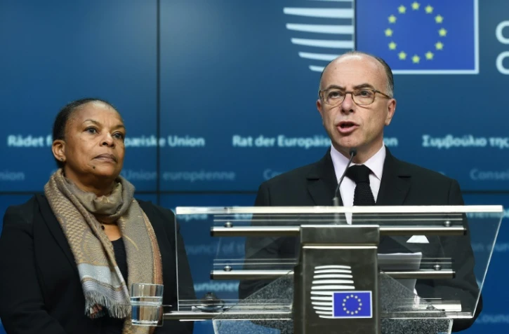 La ministre de la Justice Christiane Taubira et le ministre de l'Intérieur Bernard Cazeneuve à Bruxelles, le 20 novembre 2015