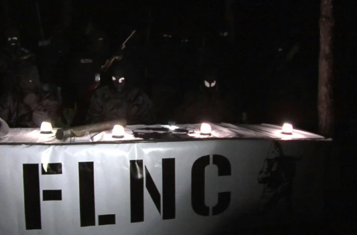 Capture d'écran d'une video de membres du "FLNC du 22 octobre" lors d'une conférence de presse nocturne dans un lieu non identifié le 2 mai 2016