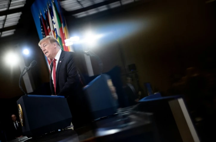 Le président des Etats-Unis Donald Trump fait un discours en clôture d'une réunion des ministres des Affaires étrangères des pays membres de la coalition internationale antijihadistes, le 6 février 2019 à Washington