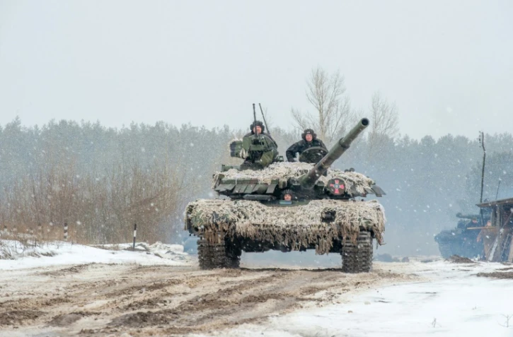 Des soldats ukrainien participent à des exercices militaires dans la région de Kharkiv, le 10 février 2022