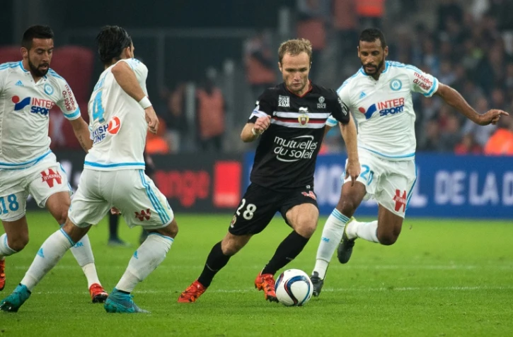 L'attaquant de Nice Valère Germain (c) contre Marseille, le 8 novembre 2015 au Stade Vélodrome