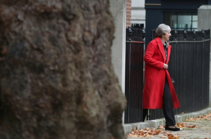 La Première ministre britannique Theresa May quitte le 10, Downing Street, le 16 novembre 2018, à Londres