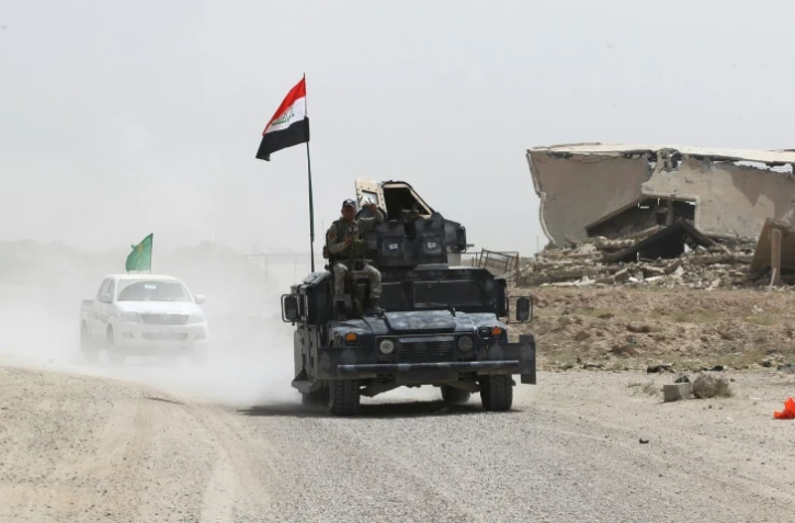 Forces gouvernementales irakiennes en route le 5 juin 2016 vers al-Azraqiyah au nord ouest de Fallouja
