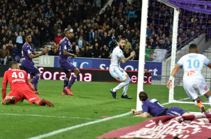 L'attaquant grec de Marseille Konstantinos Mitroglou (C) buteur à Toulouse le 11 mars 2018