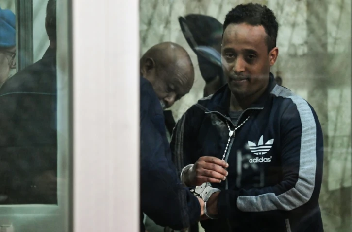 Un homme soupçonné d'être Medhanie Yehdego Mered, chef d'un réseau de trafic de migrants, mais affirmant s'appeler Medhanie Tesfamariam Behre, lors de son procès à Palerme le 14 février 2019