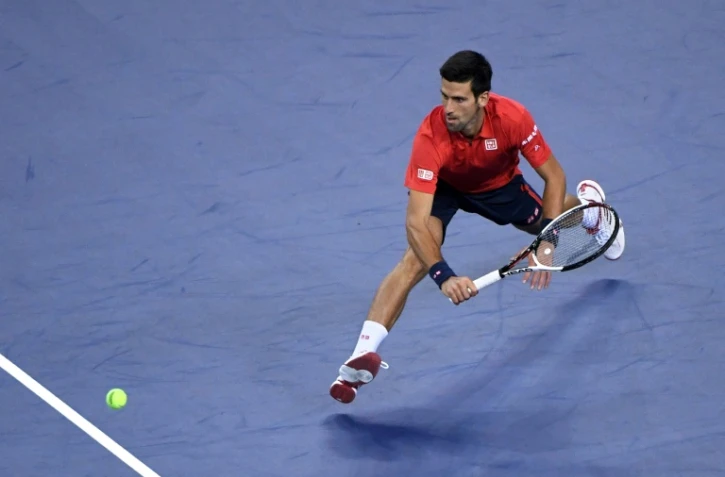 Le N.1 mondial Novak Djokovic face à l'Italien Fabio Fognini lors du tournoi de Shanghai, le 11 octobre 2016 
