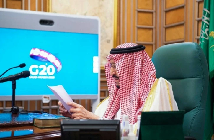 Le roi saoudien Salmane préside une vidéoconférence du G20 depuis Ryad, le 26 mars 2020