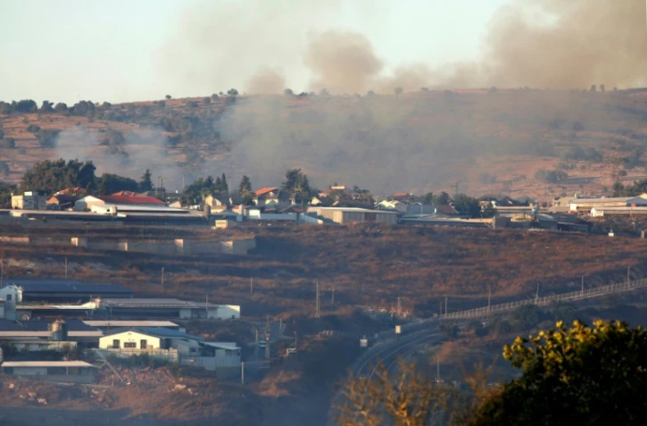 De la fumée s'élève après des tirs de missiles, dans le village israélien d'Avivim (nord), près de la frontière avec le Liban, le 1er septembre 2019