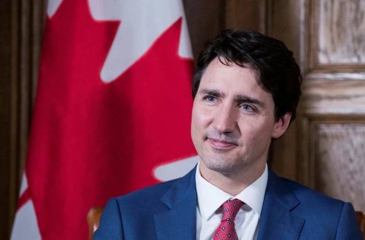 Le Premier ministre canadien Justin Trudeau répond aux questions de journalistes de l'AFP à Ottawa, le 9 mai 2018. 