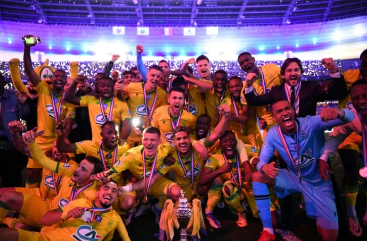 Les joueurs du FC Nantes célèbrent leur victoire en finale de Coupe de France contre l'OGC Nice (1-0) samedi 7 mai 2022 au Stade de France (Saint-Denis)