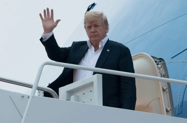 Le président américain Donald Trump arrive à la base aérienne du Maryland le 13 juin 2018, après le sommet de Singapour
