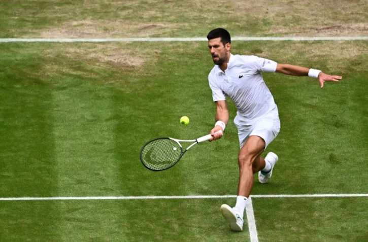Le Serbe Novak Djokovic contre le Russe Andrey Rublev en quart de finale de Wimbledon le 11 juillet 2023 à Londres