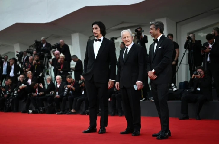 Le réalisateur américain Michael Mann (c) et les acteurs Adam Driver (g) et Patrick Dempsey (d) à la 80e Mostra de Venise pour le film "Ferrari", le 31 août 2023