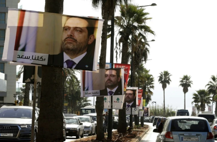 Des portraits à Beyrouth le 10 novembre 2017 du Premier ministre libanais Saad Hariri qui a annoncé sa démission surprise depuis l'Arabie saoudite il y a une semaine et n'est pas rentré dans son pays depuis