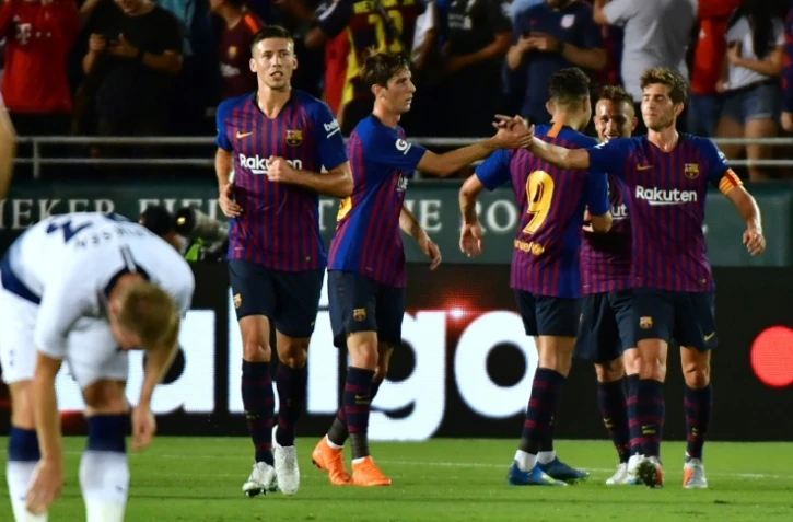 Les Barcelonais fêtent le 2e but contre Tottenham, oeuvre de la nouvelle recrue brésilienne Arthur, en match de pré-saison à Pasadena, le 28 juillet 2018