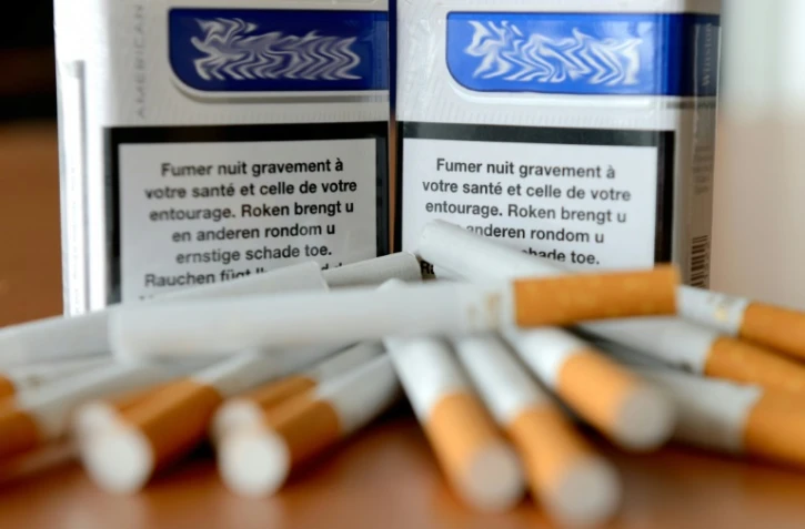 Avertissement sanitaire sur des paquets de cigarettes