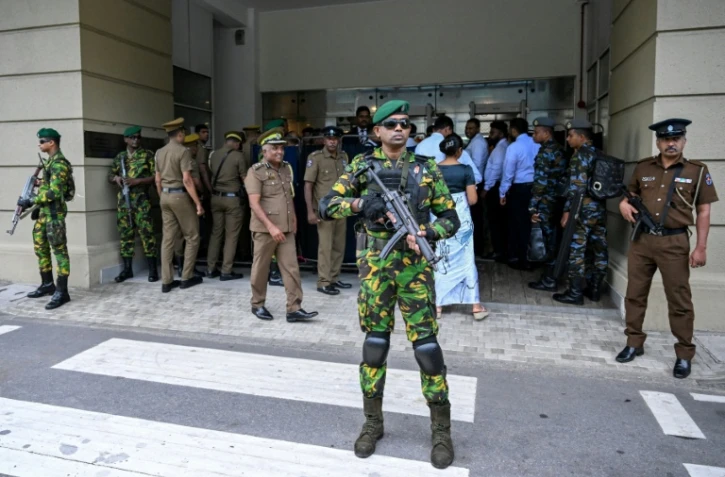 Des agents de sécurité devant la Haute Cour de Colombo, lors du prononcé du verdict du procès des accusés dans les attentats de Pâques 2019, le 22 septembre 2026 à Colombo, au Sri Lanka