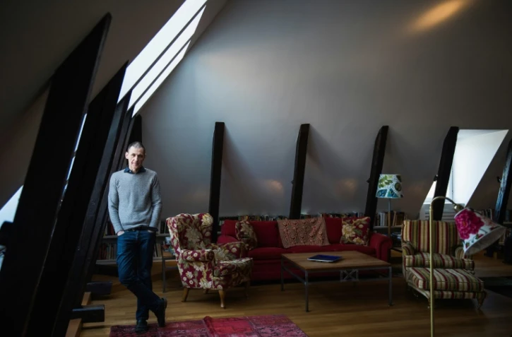 Le journaliste et auteur de best-seller suédois David Lagercrantz dans son appartement à Stockholm, en Suède, le 21 mars 2017