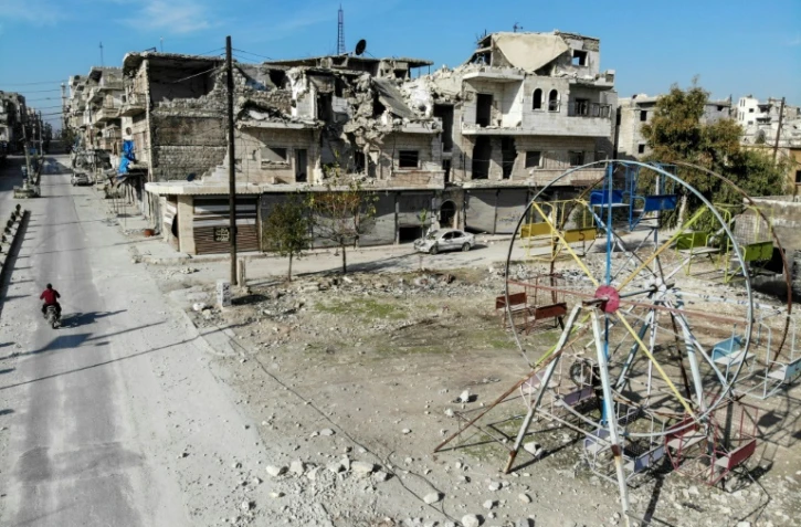 Une photo prise le 22 décembre 2019 montre des immeubles détruits dans la ville de Maaret al-Noomane dans la province d'Idleb, dans le nord-ouest de la Syrie