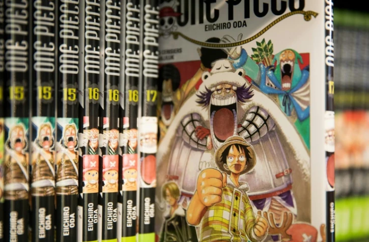 Des tomes du manga japonais à succès "One Piece" exposés lors du salon du livre de Paris le 18 mars 2019
