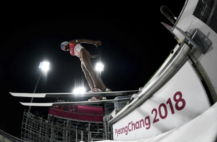 Le Polonais Dawid Kubacki lors de l'épreuve de saut à skis (tremplin normal) aux JO, le 10 février 2018 à Pyeongchang