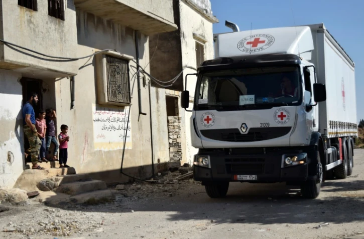Un camion humanitaire du Croissance rouge le 19 septembre 2016 au nord de Homs