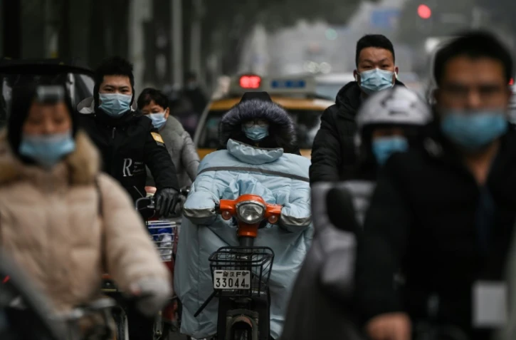Dans une rue de Wuhan, en Chine, le 28 janvier 2021