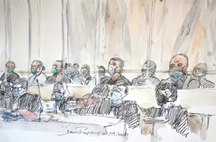 Croquis d'audience montrant les accusés et leurs avocats, lors de l'ouverture du procès des attentats de janvier 2015, le 2 septembre 2020 à Paris