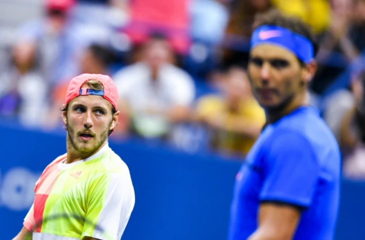 Lucas Pouille (g) face Ă Rafael Nadal en 8e de finale de l'US Open, le 4 septembre 2016 Ă New York