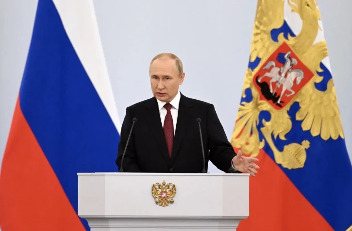 Le président russe Vladimir Poutine, lors de son discours officialisant l’annexion de quatre territoires ukrainiens à la Russie, vendredi, à Moscou.